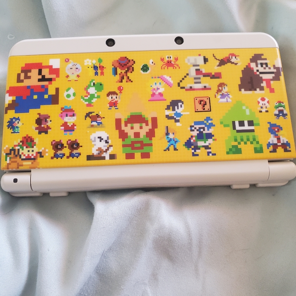 Yellow Nintendo 3DS with Charger, Pokémon Moon and Harvest Moon 3D